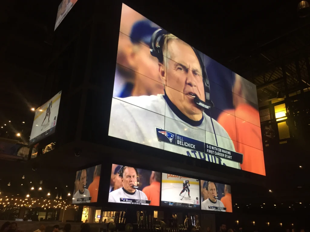 A closer view of the bar videowall and other displays underneath at the Rec Room South Edmonton Common
