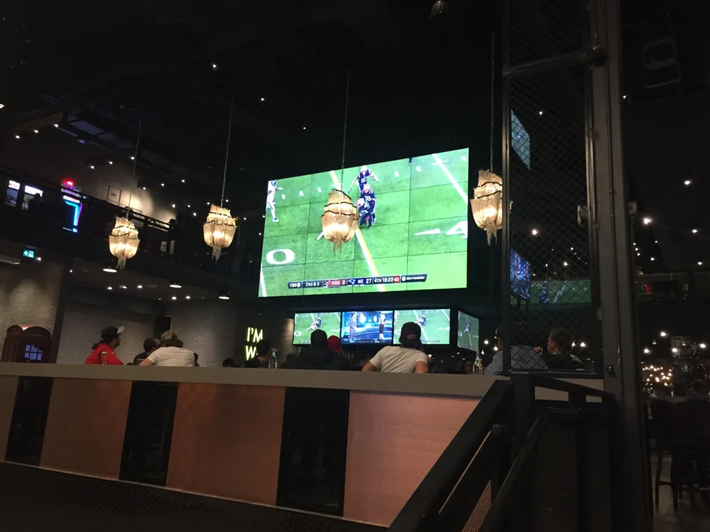 A view of the videowall and bar displays inside the Rec Room South Edmonton Common